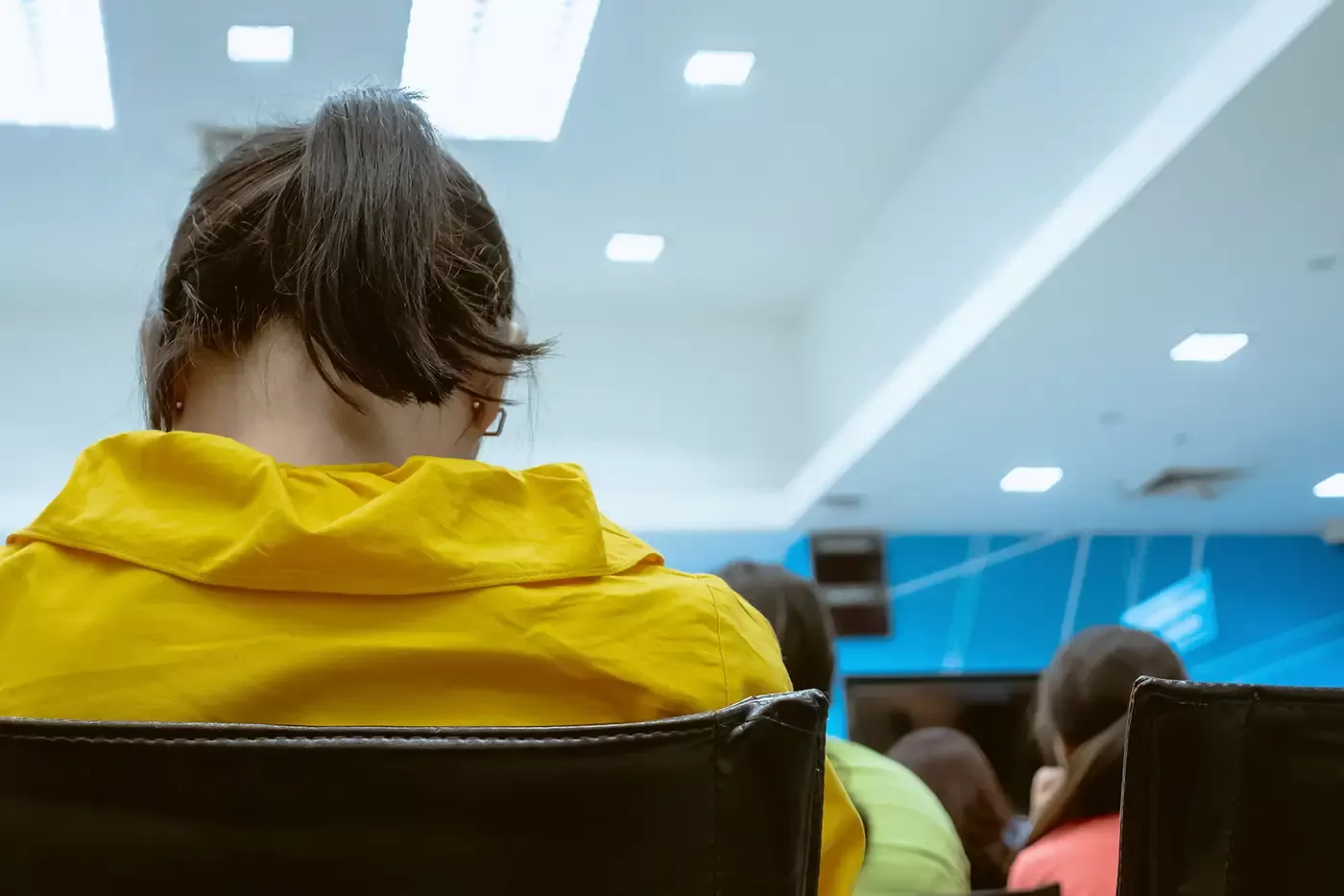 Photo of a young adult in the waiting room