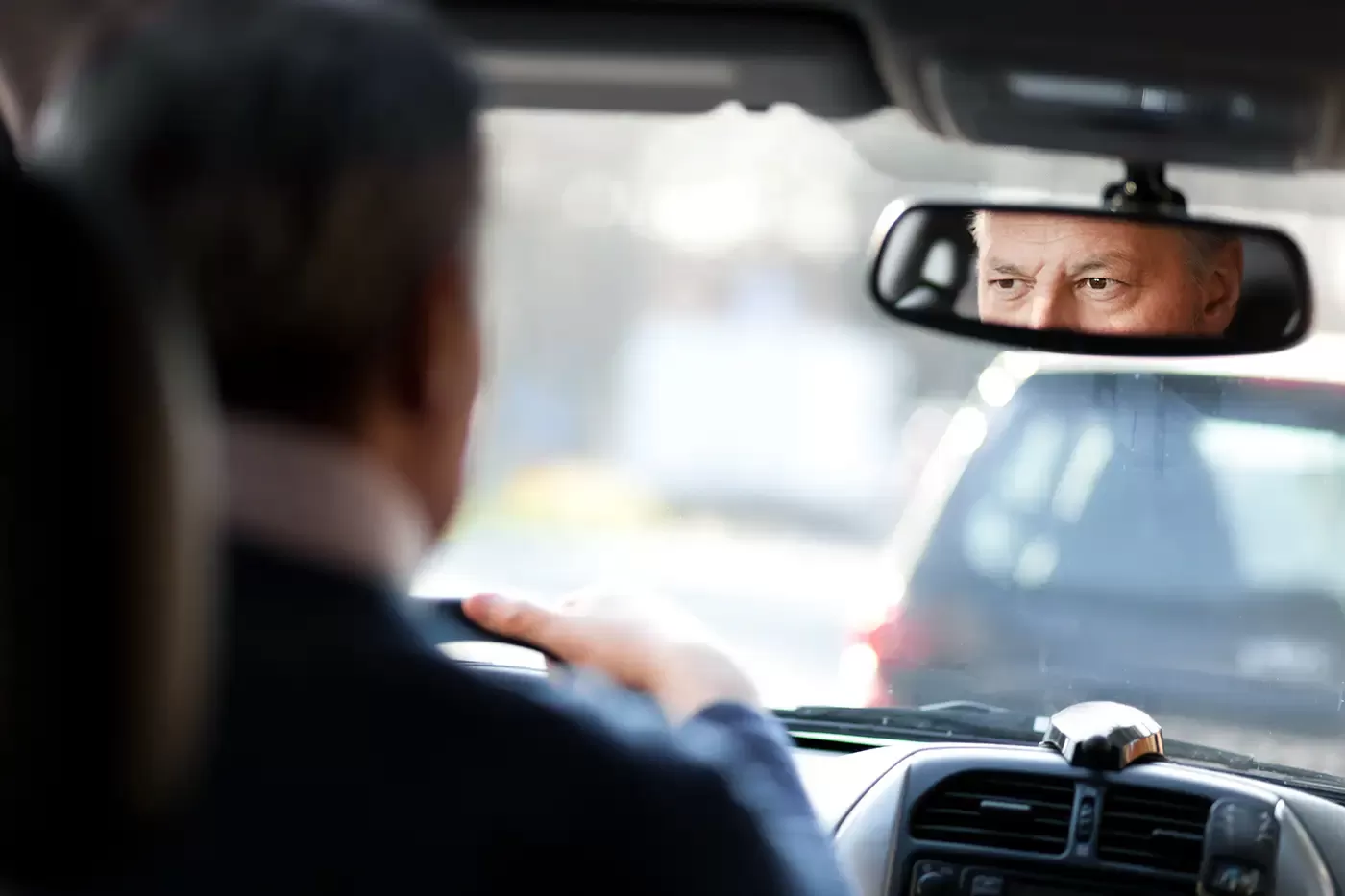 Photo of a driver in an SUV